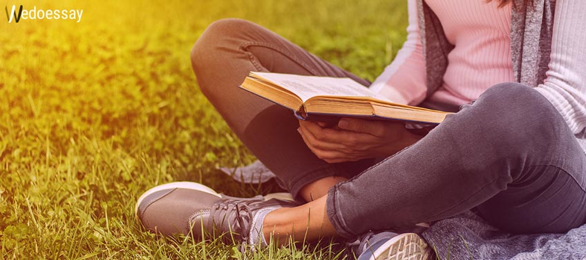 Person Reading Textbook