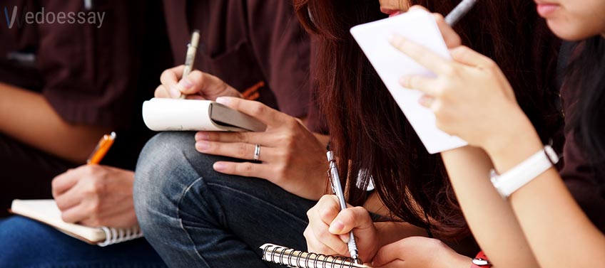 Students Writing Paper